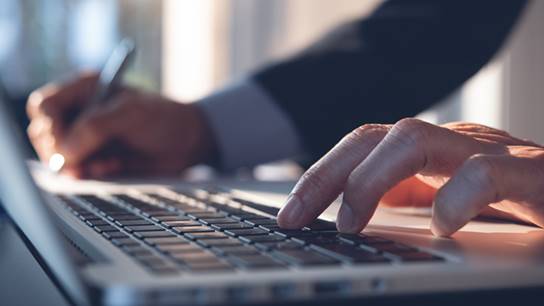 Businessman,Hand,Working,On,Laptop,Computer,,Typing,Keyboard,,Writing,On